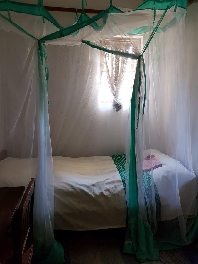 Karibuni Center Hotel Мбея Екстериор снимка