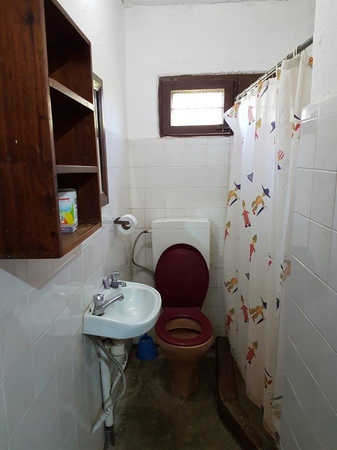 Karibuni Center Hotel Мбея Екстериор снимка