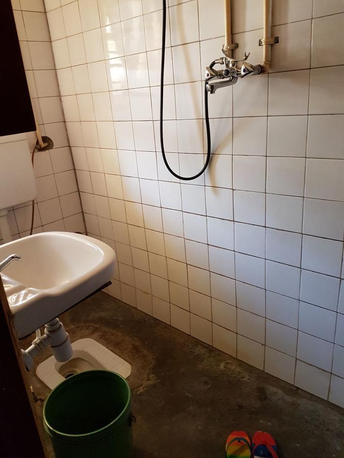 Karibuni Center Hotel Мбея Екстериор снимка